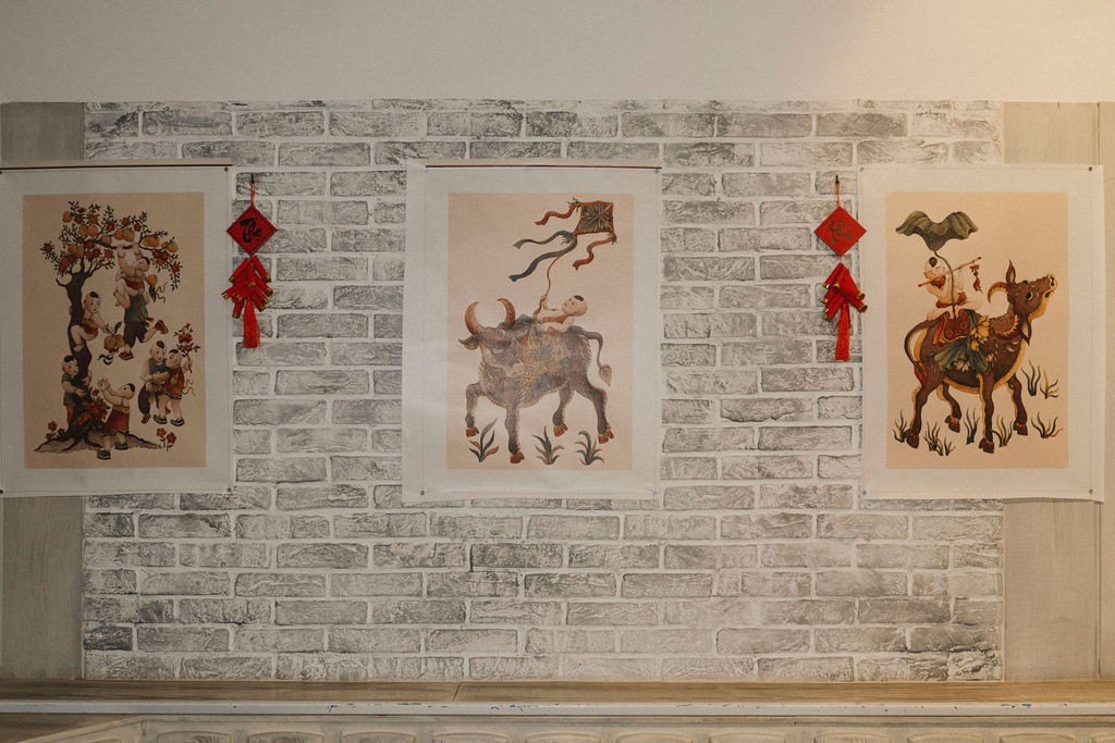 Đông Hồ prints on the brick wall at Tết